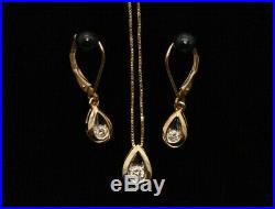 Diamond Pendant Necklace and Earring Set. 30 TCW est. Set in Yellow Gold