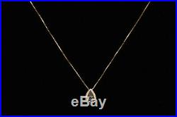 Diamond Pendant Necklace and Earring Set. 30 TCW est. Set in Yellow Gold