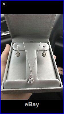 Diamond halo pendant and drop halo diamond earring set in white gold from zales