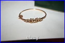 Edwardian 15 Ct Gold bangle set with pearls on lucky horseshoe