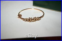Edwardian15 Ct Gold bangle set with pearls on horseshoe