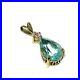 Ladies-pretty-9ct-yellow-gold-drop-pendant-set-with-an-aquamarine-CZ-stone-01-ntby