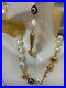 Lele-Sadoughi-Faux-Pearl-Fish-Necklace-And-Matching-Earrings-01-ggu