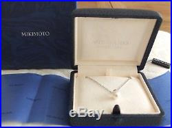Mikimoto pearl pendant, 18 carat white gold setting and 450mm chain