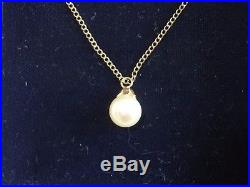 Mikimoto pearl pendant, 18 carat yellow gold setting and 450mm chain
