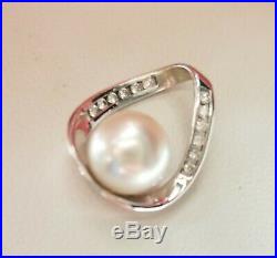Na Hoku 14k white gold white 8mm pearl pendant with channel set diamonds