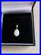 Pear-shaped-white-pearl-set-in-14-carat-yellow-gold-01-anu