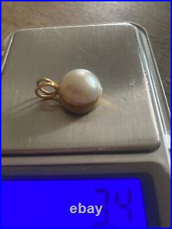 Pearl set in 18ct gold pendant 3.4g