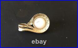 Pendant WithPearl Set In 14k Gold With Four Mini Diamonds Measured 1 7/8 X 3/4