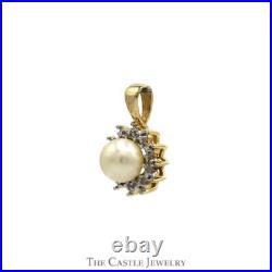 Round White Pearl Pendant with Illusion Set Diamond Halo in 10k Yellow Gold