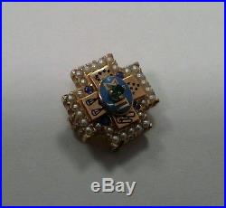 Sigma pi fraternity pin with pearls sapphires and emerald set in 10k gold