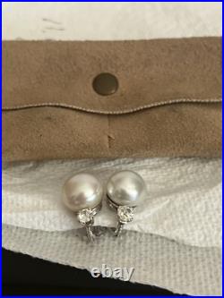 South Sea Pearls and large brilliant diamonds set in 18 kt Gold Clip-on earrings