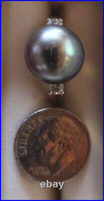 Tahitian Black Pearl ring set in white gold with diamonds