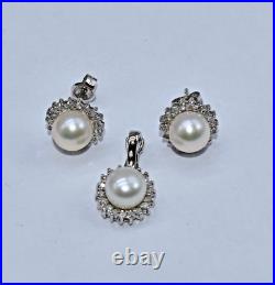 White Pearl & 0.40 CT TW White Diamond 14 K White Gold Pendant & Earrings Set White Pearl & 0.40 CT TW White Diamond 14 K White Gold Pendant & Earrings Set