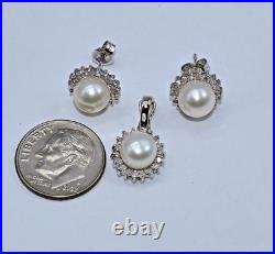 White Pearl & 0.40 CT TW White Diamond 14 K White Gold Pendant & Earrings Set White Pearl & 0.40 CT TW White Diamond 14 K White Gold Pendant & Earrings Set