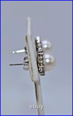 White Pearl & 0.40 CT TW White Diamond 14 K White Gold Pendant & Earrings Set White Pearl & 0.40 CT TW White Diamond 14 K White Gold Pendant & Earrings Set