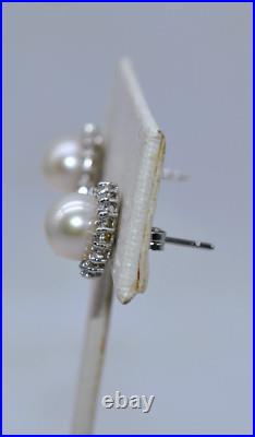 White Pearl & 0.40 CT TW White Diamond 14 K White Gold Pendant & Earrings Set White Pearl & 0.40 CT TW White Diamond 14 K White Gold Pendant & Earrings Set