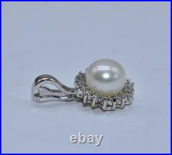 White Pearl & 0.40 CT TW White Diamond 14 K White Gold Pendant & Earrings Set White Pearl & 0.40 CT TW White Diamond 14 K White Gold Pendant & Earrings Set